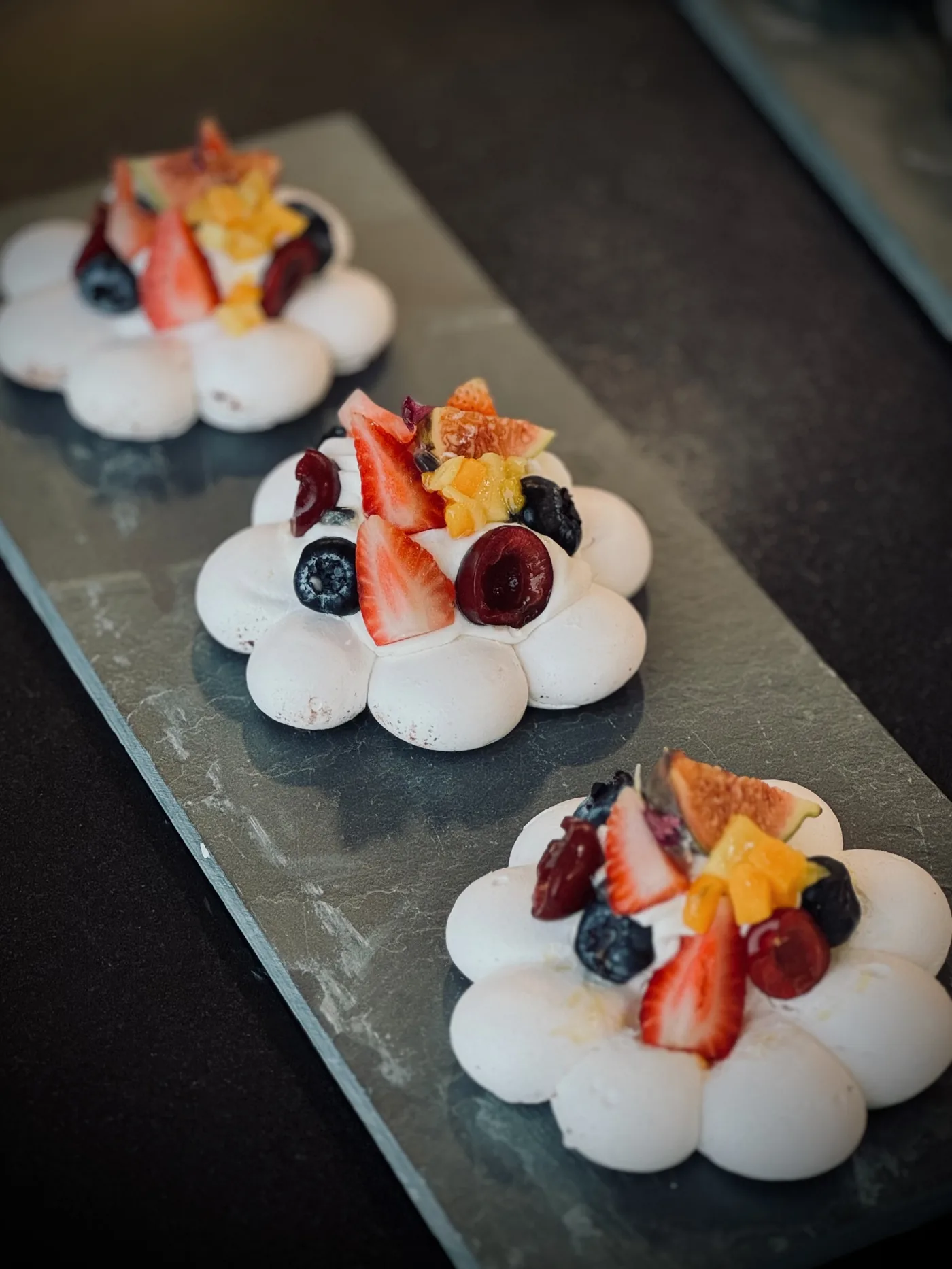 Fruit Pavlova — crisp meringue nest with vanilla Chantilly and fresh seasonal fruit